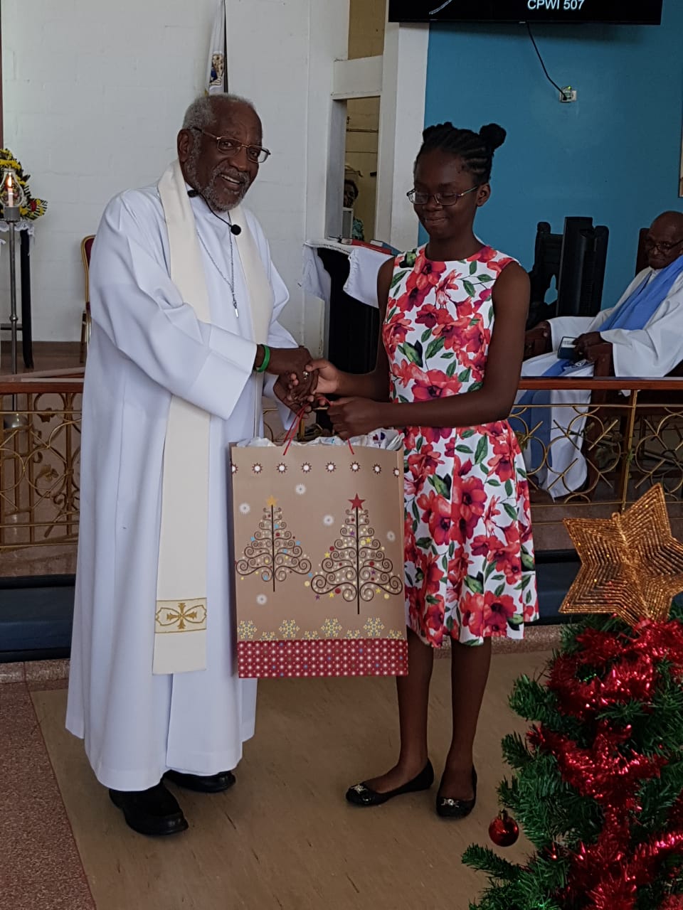 Canon West receiving his Christmas gift from La Shawn Roberts
